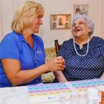 Staff Member Sharing Laugh with Patient