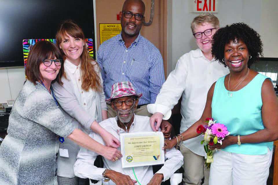 Veteran receiving certificate from MJHS