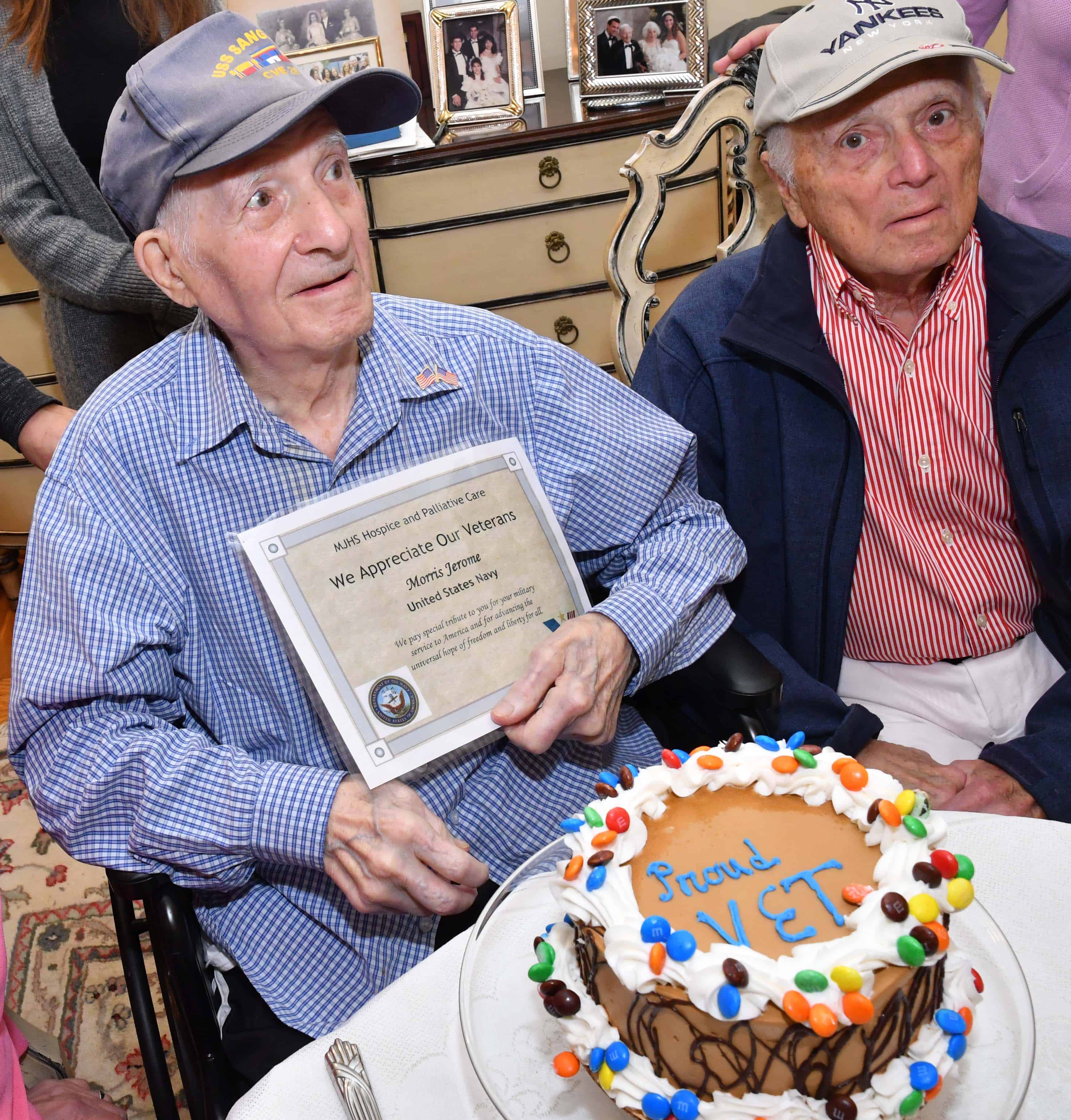 MJHS honoring a Veterans with a cake and certificate